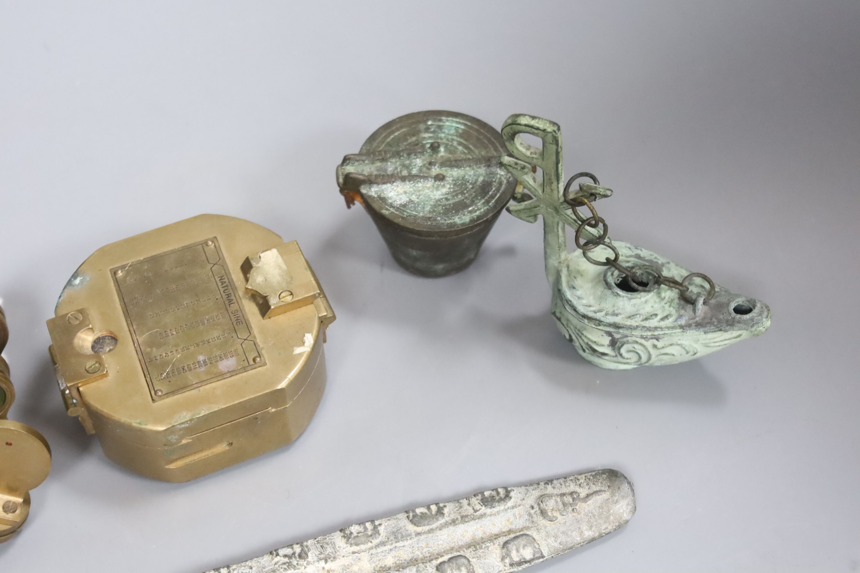 A set of cup weights, a modern level and compass and two other items